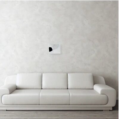 A memorized training image (a white couch) decoded from an ultrastable attractor found by cyclic denoising